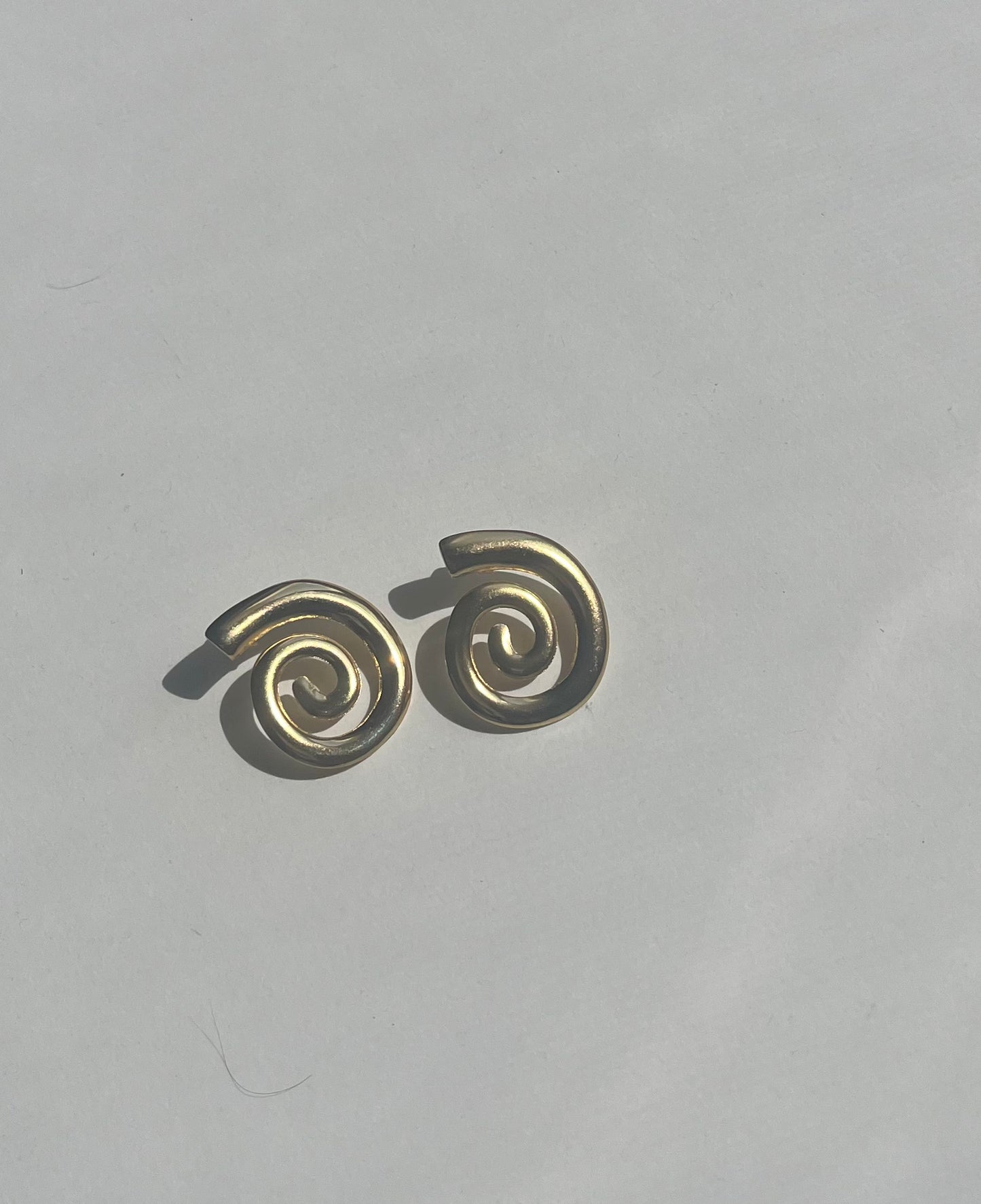 Golden Swirl Studs ( Anti Tarnish,Waterproof)